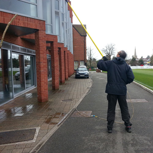 Reach and Wash pure water commercial window cleaning in action